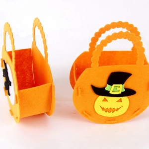 Halloween orange felt gift bag featuring pumpkin and witch hat designs for candy storage