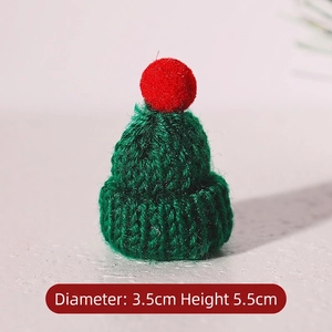 Mini green knitted Christmas hat with red pompom and 3.5cm diameter for holiday decor