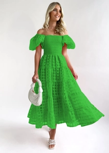 Detail of off-shoulder puff sleeves and green plaid jacquard texture on flowy maxi dress