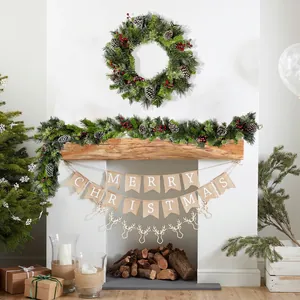 Christmas wreath with pine needles, red berries, and Merry Christmas burlap banner set
