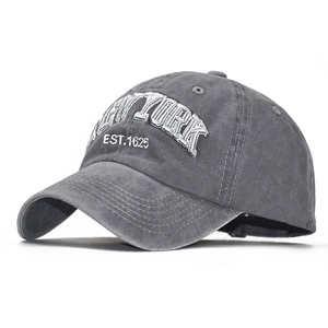 Washed cotton baseball cap in dark grey featuring white New York embroidery details
