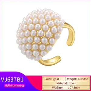 Elegant gold-plated brass ring with micro-set pearls in a vintage dome design
