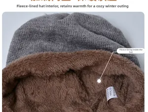 Detail of warm grey knit hat showing thick brown fleece lining and material wash label