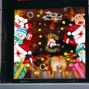 Detail view of festive Merry Christmas window stickers with Santa, Reindeer and Snowman