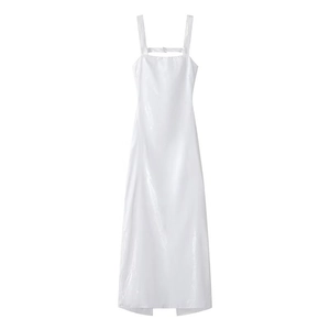 Detailed view of white long slip dress with glossy finish and slim fit silhouette