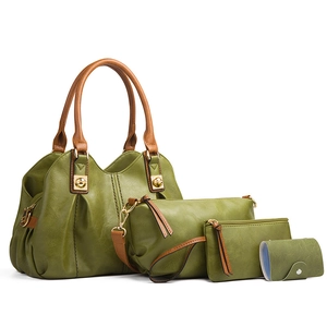 Olive green four-piece tote bag set with brown handles and gold hardware on white background
