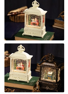 Detail of Christmas music snow globe lanterns with warm LED lighting and festive figures