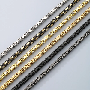 Byzantine stainless steel necklaces in six colors including gold and silver on grey background