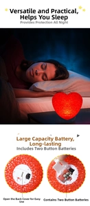 Macro detail of red heart-shaped LED lamp showing the battery compartment and texture
