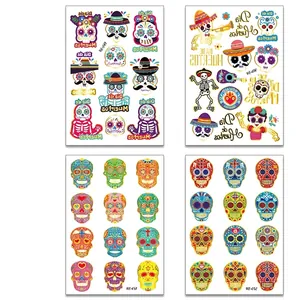 Day of the Dead floral skull temporary tattoos with gold foil accents for Halloween.