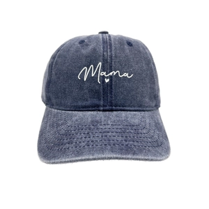 Detail of embroidered 'Mama' text and heart on washed denim vintage baseball cap