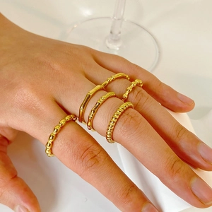 18K gold plated stainless steel bamboo and braided ring set worn on female hand