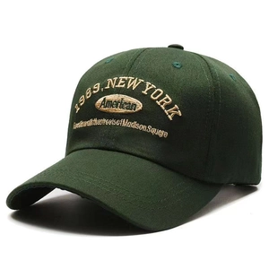 Retro dark green cotton baseball cap with 1989 New York embroidery and 45-degree angle view