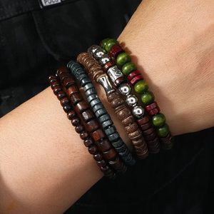 Detail showing layers of vintage wooden and coconut beads with silver metal accents