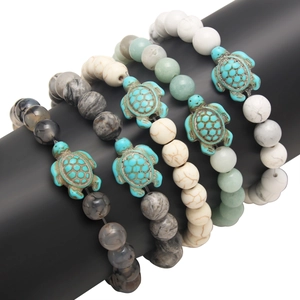 Five-piece beaded turtle bracelet set with turquoise and volcanic stone charms