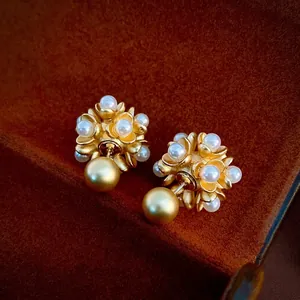Elegant gold flower pearl earrings featuring a classic retro design for women