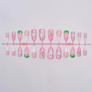 Detailed view of 24pcs 3D fruit press-on nails with strawberry and pineapple relief art