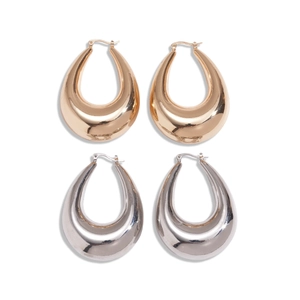 Polished gold and silver chunky teardrop hoop earrings with high-gloss metallic finish