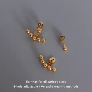 Adjustable golden ball stud earrings in 18K gold plated steel with three-hole design