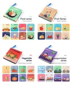 Detailed view of four educational cloth books covering food, fruit, and transport themes
