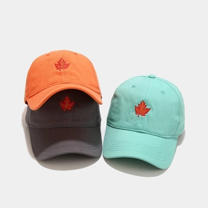 Classic maple leaf embroidery baseball caps in bright orange, grey, and mint green