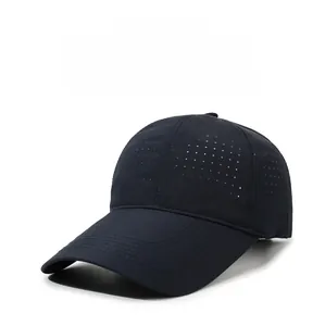 Detail of laser-cut ventilation holes on black quick-dry breathable baseball cap