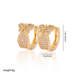 Detail view of gold butterfly hoop earrings with dimensions 1.4cm height and 1cm width