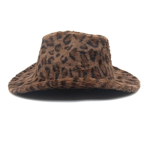 Close-up of leopard print faux fur texture and rolled brim on a jazz cowboy hat