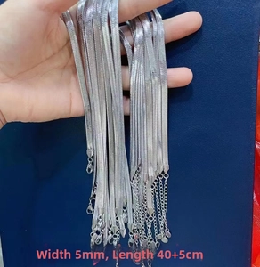 Detail view of 5mm silver snake chain link showing lobster clasp and 40+5cm length