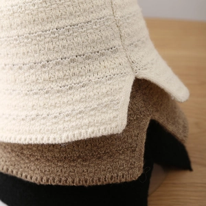 Chunky knit fisherman bucket hats in white, brown and black with side slit detail