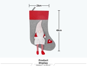Detailed view of grey felt Christmas stocking with gnome and 48cm height dimension
