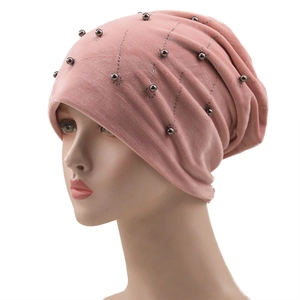Women's pink velvet slouchy beanie with rhinestone and bead decorations for winter