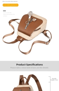 Detail of the 9cm handle and contrasting brown and beige PU leather on this backpack