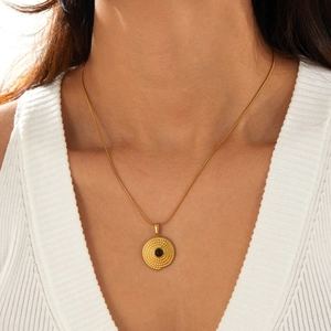 Collier vintage en acier inoxydable doré avec pendentif rond texturé oeil de tigre