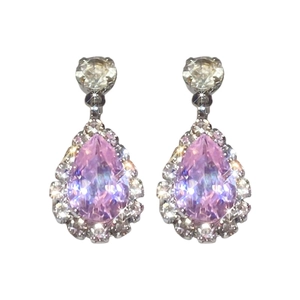 Elegant silver earrings with pear-cut pink gems and white halo crystals on white background