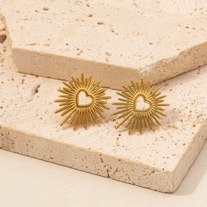 Golden 304 stainless steel heart stud earrings with radiant sunburst design