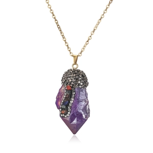 Detail of purple crystal pendant necklace with colorful rhinestones on golden chain
