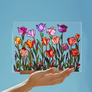 Detail of colorful tulip art on transparent acrylic plaque with solid wood base stand
