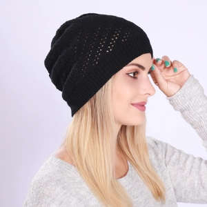 Detail shot of black pointelle knit slouchy beanie showing the breathable hollow pattern
