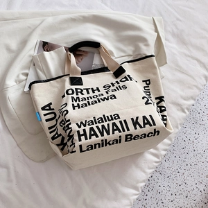 Minimalistische Canvas-Einkaufstasche mit schwarzem Rand und Hawaii-Aufdruck auf hellem Stoff