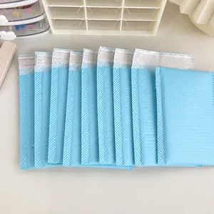 Detail of light blue padded bubble mailer with self-adhesive seal and shockproof design