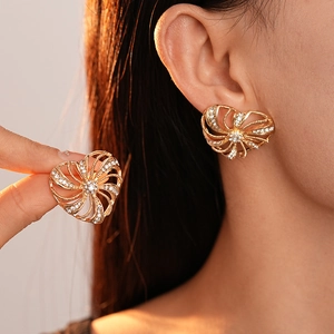 Elegant gold heart earrings with sunburst hollow design and sparkling crystals for women