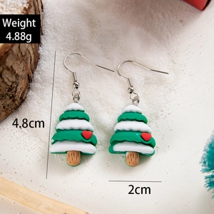 Handmade green resin Christmas tree earrings with heart detail and silver hooks