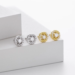 Elegant S925 sterling silver twisted halo stud earrings with gold and silver finishes