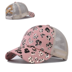 Detail of pink leopard print baseball cap with glittery pattern and breathable mesh back