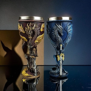 Detailed relief of dragon and sword on a gothic wine goblet with stainless steel liner