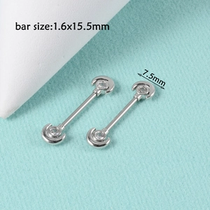 Detail showing silver crescent moon nipple rings with 1.6x15.5mm bar size dimensions