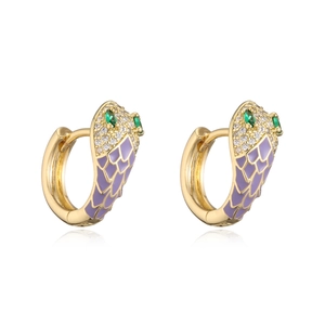 Detail of snake hoop earrings with purple enamel scales and green zircon accents