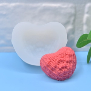 Heart-shaped silicone mold with coral texture for handmade soap and candles