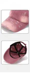 Detail of pink vintage distressed baseball cap with ripped brim and precise stitching